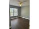 Cozy bedroom with hardwood floors and natural light at 2520 Park Lake Dr, Deland, FL 32724
