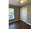 Bedroom featuring wood floors and a closet at 2520 Park Lake Dr, Deland, FL 32724