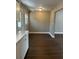 A dining room with stylish flooring and ample natural light, ready for your personal touch at 2520 Park Lake Dr, Deland, FL 32724