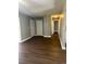 Comfortable living space featuring hardwood floors and neutral paint, perfect for relaxation at 2520 Park Lake Dr, Deland, FL 32724