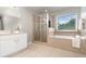 Bright bathroom featuring a tub, a shower, and a vanity with a mirror at 289 Magnolia Park Trl, Sanford, FL 32773