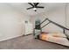 Cozy bedroom featuring a modern canopy bed, a dresser, natural light, and ceiling fan at 289 Magnolia Park Trl, Sanford, FL 32773