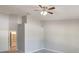 Spacious bedroom with neutral walls, ceiling fan, and carpeted floors at 3004 Cottage Grove Ct # 1805, Orlando, FL 32822