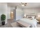 This beautifully staged bedroom features neutral colors and carpet, perfect for a relaxing retreat at 3004 Cottage Grove Ct # 1805, Orlando, FL 32822
