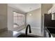 Bright kitchen area features granite countertops, stainless steel appliances, and large window at 3004 Cottage Grove Ct # 1805, Orlando, FL 32822