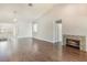 Spacious living area with hardwood floors, bright recessed lighting, and cozy fireplace, creating an inviting atmosphere at 3004 Cottage Grove Ct # 1805, Orlando, FL 32822