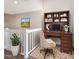 Upstairs loft area with a built-in bookshelf and desk, perfect for a home office at 3004 Cottage Grove Ct # 1805, Orlando, FL 32822