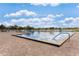 Enjoy the day at this large pool with bricked patio, sunny skies and palm trees at 3004 Cottage Grove Ct # 1805, Orlando, FL 32822