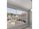 View through a large window offers natural light and neighborhood scenery at 3004 Cottage Grove Ct # 1805, Orlando, FL 32822