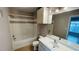 Bright bathroom featuring a bathtub, single sink vanity with tile backsplash at 3702 Palm Desert Ln # 5435, Orlando, FL 32839