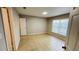 Bright, spacious bedroom with tile flooring, natural light, and neutral paint at 3702 Palm Desert Ln # 5435, Orlando, FL 32839
