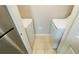 Conveniently located laundry room off the kitchen with stacked washer and dryer at 3702 Palm Desert Ln # 5435, Orlando, FL 32839