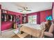 Cozy bedroom featuring a ceiling fan, and brightly painted built in closet for ample storage at 3759 Collingwood Ln, Oviedo, FL 32765