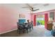 Dining room area with a table, chairs, and sliding glass door to the backyard at 3759 Collingwood Ln, Oviedo, FL 32765