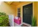 Cozy front porch featuring a charming seating area, perfect for relaxing and enjoying the neighborhood view at 3759 Collingwood Ln, Oviedo, FL 32765