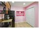 Bright kitchen with appliances and a decorative shelf at 3759 Collingwood Ln, Oviedo, FL 32765