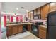Well-equipped kitchen with modern appliances and ample cabinet space, perfect for culinary enthusiasts at 3759 Collingwood Ln, Oviedo, FL 32765