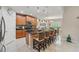 Well-equipped kitchen featuring a center island with bar seating and stainless steel appliances at 3824 Gulf Shore Cir, Kissimmee, FL 34746