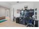 Office space with black desk, comfortable chair, and natural lighting at 3824 Gulf Shore Cir, Kissimmee, FL 34746