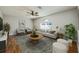 Inviting living room featuring comfortable seating and a ceiling fan at 4113 Stonefield Dr, Orlando, FL 32826