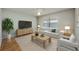 Comfortable living room with modern decor and plenty of natural light at 4113 Stonefield Dr, Orlando, FL 32826