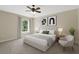Inviting bedroom with neutral walls, plush carpet, natural light, ceiling fan, and modern decorations at 4153 Cortland Dr, Davenport, FL 33837