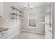 Bright breakfast nook with tiled floors, shelving, and natural light at 4153 Cortland Dr, Davenport, FL 33837