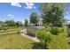 Hot tub in a landscaped backyard, surrounded by a black fence at 4153 Cortland Dr, Davenport, FL 33837