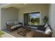 Comfortable patio with sliding glass door and stylish patio furniture at 4153 Cortland Dr, Davenport, FL 33837