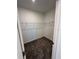 A simple walk-in closet with wire shelving and soft carpet at 4720 Homestead Trl, St Cloud, FL 34772