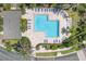 Aerial view of the community pool with poolside lounge chairs at 5037 Hawkstone Dr, Sanford, FL 32771