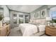 Serene bedroom with neutral tones, ample natural light, and tasteful furnishings for a relaxing retreat at 5229 Quillback Ln, St Cloud, FL 34771
