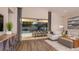 Open-concept living room flows to outdoor area with screened patio and dining at 5259 Quillback Ln, St Cloud, FL 34771