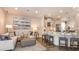 Beautifully designed living space featuring a modern kitchen, dining area, and comfortable seating at 5259 Quillback Ln, St Cloud, FL 34771