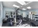 Well-equipped community gym with exercise machines, free weights, and mirrors, promoting a healthy and active lifestyle at 5300 S Atlantic Ave # 6-301, New Smyrna Beach, FL 32169