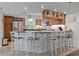 Eat-in kitchen boasts stainless steel appliances and breakfast bar seating at 5300 S Atlantic Ave # 6-301, New Smyrna Beach, FL 32169