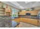 Well-equipped kitchen with sleek countertops, ample cabinet space, and stainless steel appliances at 5300 S Atlantic Ave # 6-301, New Smyrna Beach, FL 32169