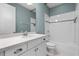 Bathroom features white cabinetry, quartz countertops, a shower and a combined bathtub at 5711 Hamlin Groves Trl, Winter Garden, FL 34787
