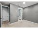 Spacious bedroom with ensuite bathroom and walk-in closet entrance at 5711 Hamlin Groves Trl, Winter Garden, FL 34787