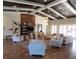 Spacious clubhouse living room with cozy seating, a fireplace, and stylish decor for community gatherings at 5711 Hamlin Groves Trl, Winter Garden, FL 34787