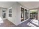 Charming covered patio area, ideal for relaxation and entertaining at 5711 Hamlin Groves Trl, Winter Garden, FL 34787