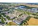 Aerial view showcases a residential area near shopping, illustrating the convenience and lifestyle offered by this community at 5711 Hamlin Groves Trl, Winter Garden, FL 34787