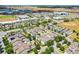 Aerial view showcases a residential area near shopping, illustrating the convenience and lifestyle offered by this community at 5711 Hamlin Groves Trl, Winter Garden, FL 34787