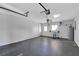 Spacious garage with water heater and utility sink and large door at 6366 Sw 115Th Street Rd, Ocala, FL 34476
