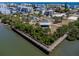 Aerial view showcasing a scenic pier, playground, and gazebo, providing residents with abundant recreational opportunities at 865 Ladyfish Ave # C104, New Smyrna Beach, FL 32169