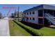 Exterior view of house with Beach Access sign and nearby beach at 865 Ladyfish Ave # C104, New Smyrna Beach, FL 32169