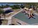 A vibrant community playground with slides and a picnic shelter, ideal for Gathering fun and outdoor gatherings at 865 Ladyfish Ave # C104, New Smyrna Beach, FL 32169