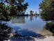 Scenic view of a serene body of water, showcasing nearby houses and canoes for outdoor enjoyment at 865 Ladyfish Ave # C104, New Smyrna Beach, FL 32169