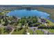 Aerial shot showcasing luxury homes with lake access and beautifully landscaped yards at 9222 Charles E Limpus Rd, Orlando, FL 32836