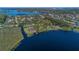 This estate offers tranquil lake views and established landscaping, perfect for peaceful waterfront living in a desirable location at 9222 Charles E Limpus Rd, Orlando, FL 32836